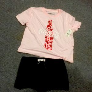 Junior size 7 outfit. Shorts are by “No Boundaries “top Coca-Cola size 7-8